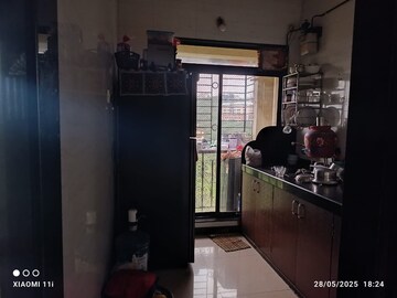 Kitchen in 2 BHK Apartment at Suncity Shrushti, Seawoods – for Rent
