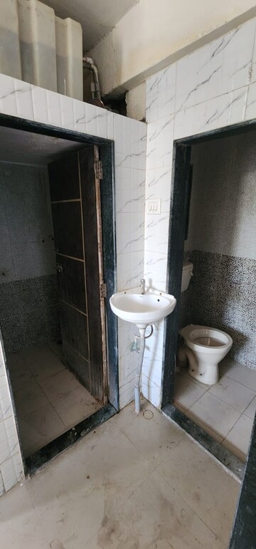 Bathroom in 1 BHK Apartment at Shah And Daswani Kashidham Apartment, Virar West – for Sale