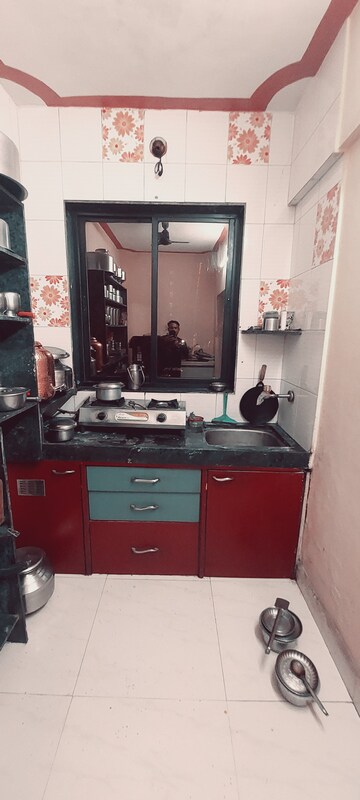 Kitchen in 1 BHK Apartment at Kharegaon – for Sale