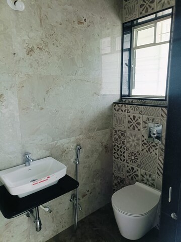Bathroom in 2 BHK Apartment at Rachana Shree Apartment, Dahanukar Colony – for Rent