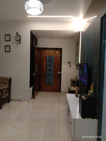 Living Room in 2 BHK Apartment at Harmony Signature Towers, Owale – for Rent