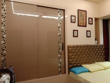 Bedroom in 2 BHK Apartment at Harmony Signature Towers, Owale – for Rent