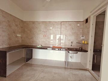 Kitchen in 4 BHK Apartment at Nirman Vishnubaug, Model Colony – for Rent