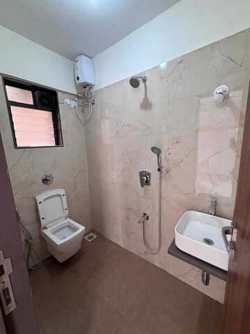 Bathroom in 2 BHK Apartment at Chaitanya Anand Lunkhod CHSL, Andheri West – for Rent