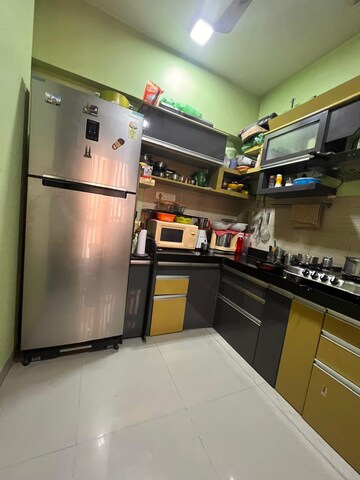 Kitchen in 2 BHK Apartment at Lodha Luxuria, Majiwada – for Rent