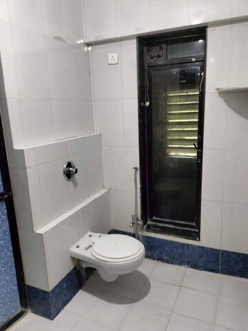 Bathroom in 3 BHK Apartment at Vasant Vihar – for Rent