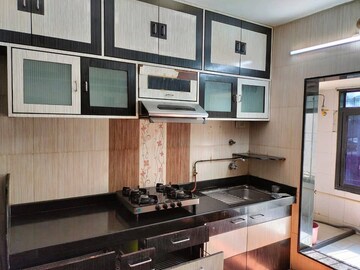 Kitchen in 3 BHK Apartment at Vasant Vihar – for Rent