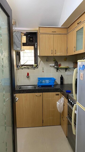 Kitchen in 1.5 BHK Apartment at Raheja Skylark Apartment, Bandra West – for Rent