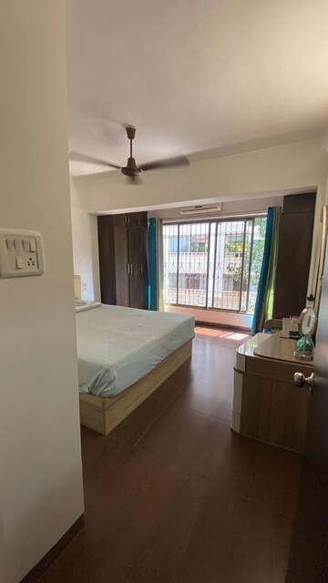 Living Room in 1.5 BHK Apartment at Raheja Skylark Apartment, Bandra West – for Rent