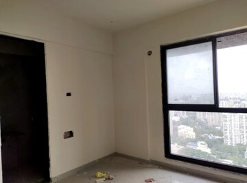Room in 2 BHK Apartment at Dev Leo Tower, Oshiwara – for Rent