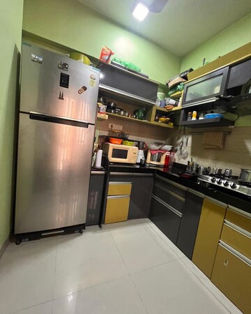 Kitchen in 2 BHK Apartment at Lodha Luxuria, Majiwada – for Rent