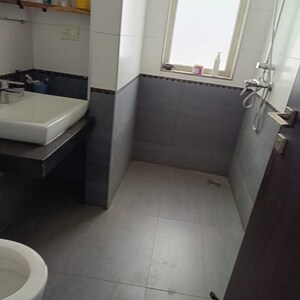 Bathroom in 4 BHK Apartment at Tata Raheja Raisina Residency, Sector 59 – for Sale