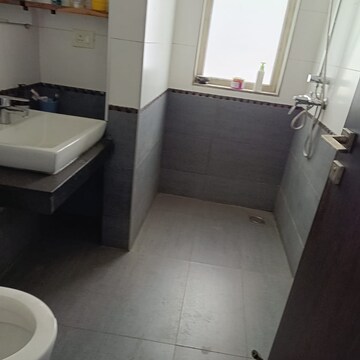 Bathroom in 4 BHK Apartment at Tata Raheja Raisina Residency, Sector 59 – for Sale