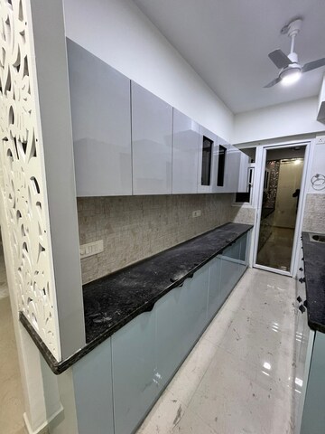 Kitchen in 2 BHK Apartment at Signature The Millennia 2, Sector 37d – for Rent