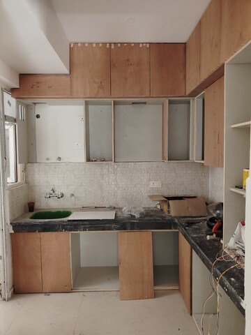 Kitchen in 2 BHK Apartment at Signature The Millennia 2, Sector 37d – for Rent