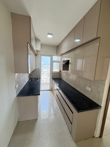 Kitchen in 2 BHK Apartment at Signature The Millennia 2, Sector 37d – for Rent