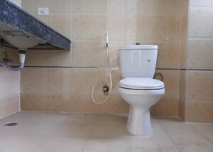 Bathroom in 2 BHK Apartment at Antriksh Golf View, Sector 78 – for Sale