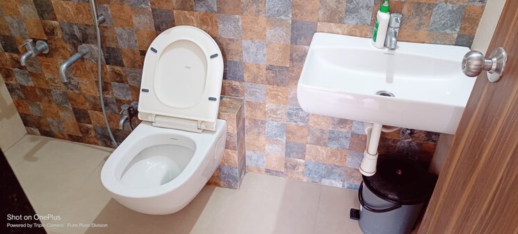 Bathroom, abhinav-pebbles-urbania 2 Bedroom 1050 Sq.Ft. Apartment In Bavdhan Pune 8747890