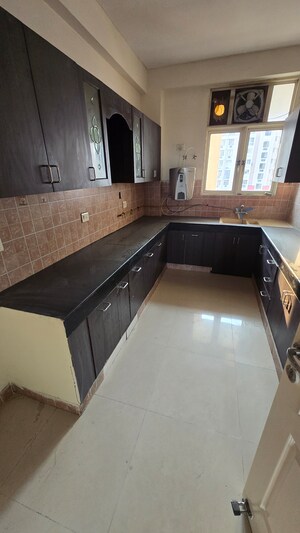 Kitchen in 2.5 BHK Apartment at Eldeco Riviera, Pi Greater Noida – for Sale