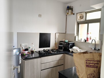 Kitchen in 1 BHK Apartment at Hiranandani Lavinia, Ghodbunder Road – for Rent