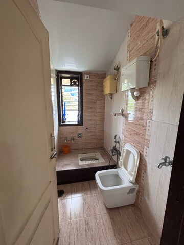 Bathroom in 2 BHK Apartment at Yash Shilpa CHS, Naupada – for Sale