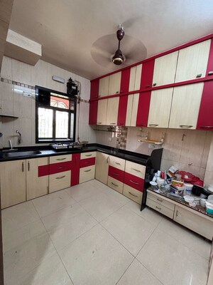 Kitchen in 2 BHK Apartment at Yash Shilpa CHS, Naupada – for Sale