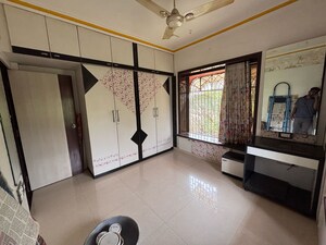 Living Room in 2 BHK Apartment at Yash Shilpa CHS, Naupada – for Sale