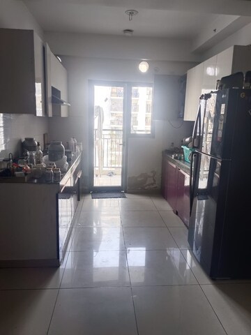 Kitchen in 3 BHK Apartment at Gulshan Bellina, Sector 16 Greater Noida – for Rent