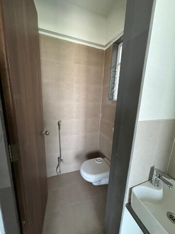 Bathroom in 1 BHK Apartment at Divine Palm Springs, Wakad – for Rent
