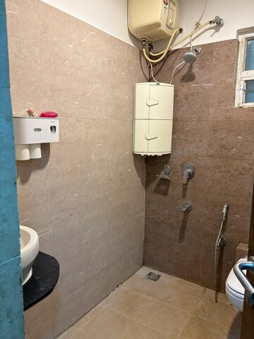 Bathroom in 3 BHK Apartment at Ramky Serene Woods, Doddaballapura Road – for Rent