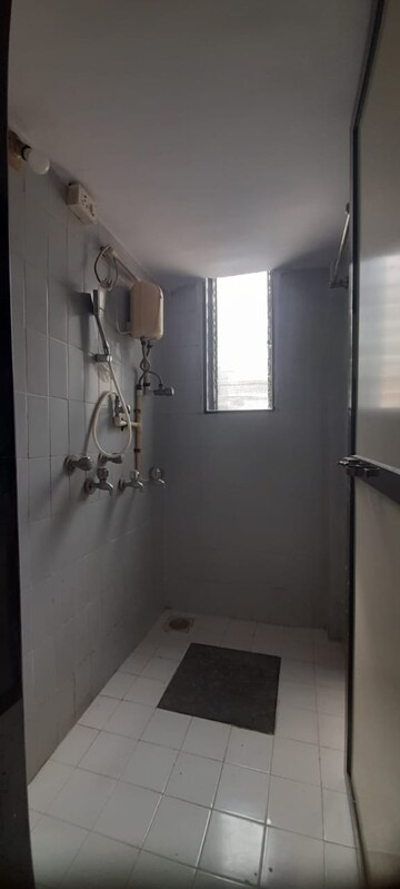 Bathroom in 1 BHK Apartment at Raheja Township, Malad East – for Rent