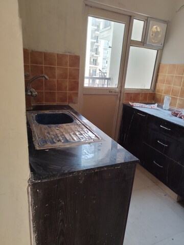Kitchen in 3 BHK Apartment at Aims Golf Avenue II, Sector 75 – for Rent