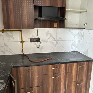 Kitchen in 2 BHK Villa at RWA Apartments Sector 27, Sector 27 – for Rent