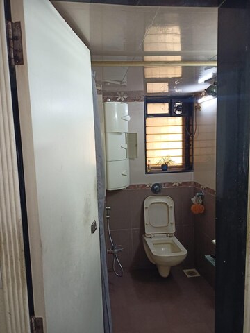 Bathroom in 2 BHK Apartment at Woodland Apartment, Andheri West – for Rent