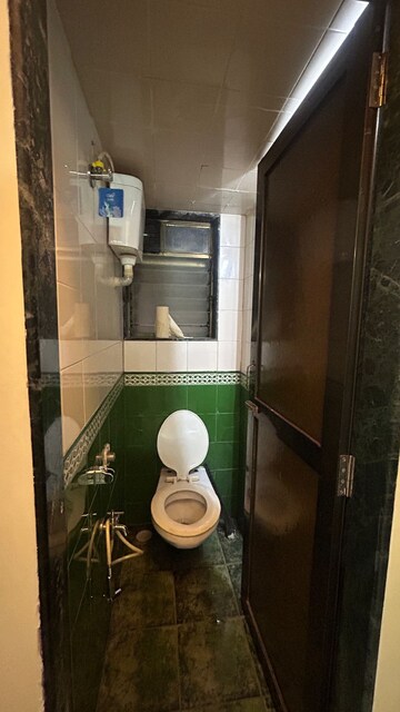 Bathroom in 1 BHK Apartment at Greenfield Rocks CHS, Jogeshwari East – for Rent