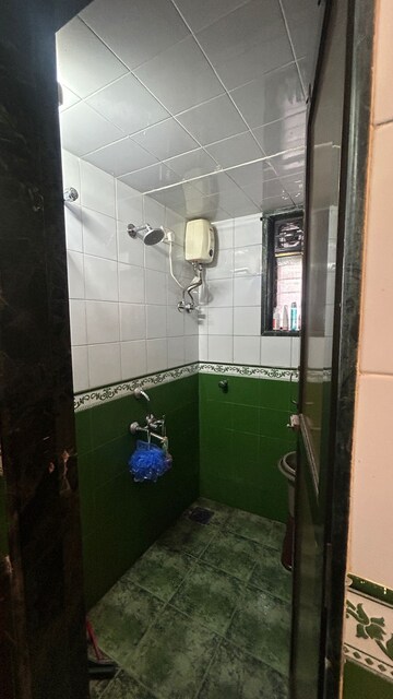 Bathroom in 1 BHK Apartment at Greenfield Rocks CHS, Jogeshwari East – for Rent