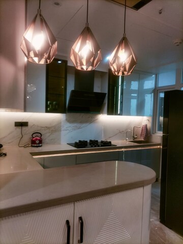 Kitchen in 4 BHK Apartment at Mahagun Mezzaria, Sector 78 – for Rent