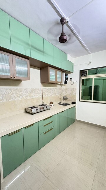 Kitchen in 2 BHK Apartment at Hiranandani Garden Blue Bell, Powai – for Rent