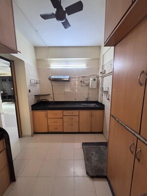 Kitchen in 3 BHK Apartment at Parth Dimple Heights, Kandivali East – for Sale
