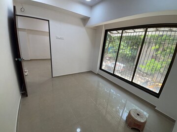 Room in 2 BHK Apartment at Malad East – for Rent