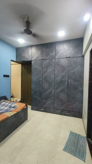 Bedroom in 1 BHK Apartment at Poonam Complex, Kandivali East – for Sale