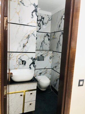 Bathroom in 4 BHK Builder Floor at Raj Nagar – for Sale