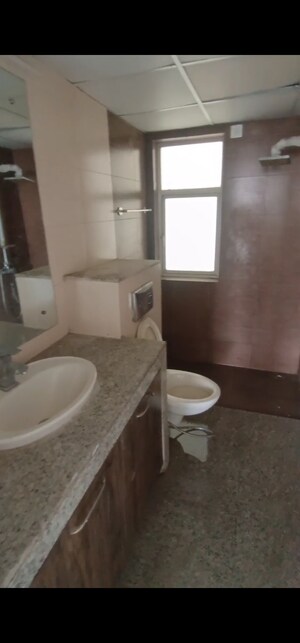 Bathroom in 3 BHK Apartment at Raheja Vedaanta, Sector 108 – for Sale