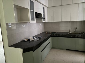 Kitchen in 2 BHK Apartment at JKG Palm Court, Sector 16c Greater Noida – for Rent