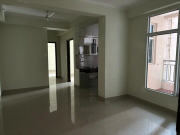 Living Room in 2 BHK Apartment at JKG Palm Court, Sector 16c Greater Noida – for Rent