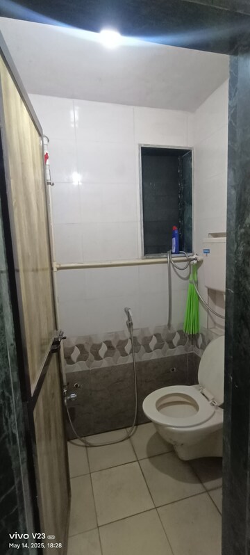 Bathroom in 1 BHK Apartment at Vasundhara CHS Gokuldham, Gokuldham Colony – for Rent