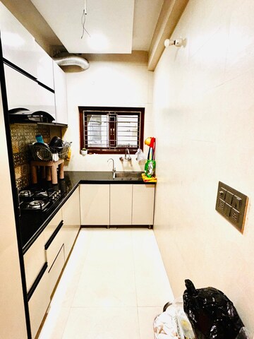 Kitchen in 2 BHK Apartment at Koteshwar Niwas CHS, Vile Parle East – for Rent