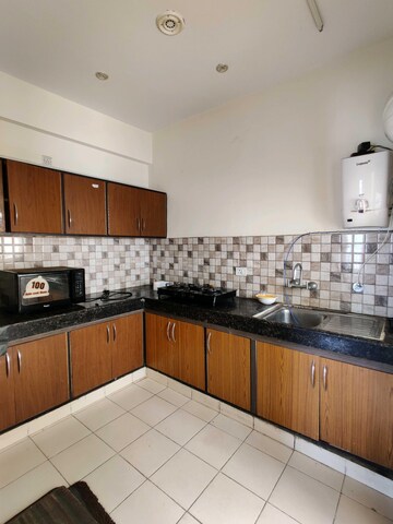 Kitchen in 4 BHK Apartment at Mapsko Casa BellA-Villas, Sector 82 – for Sale