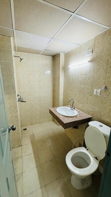 Bathroom in 2.5 BHK Apartment at Logix Blossom County, Sector 137 – for Rent