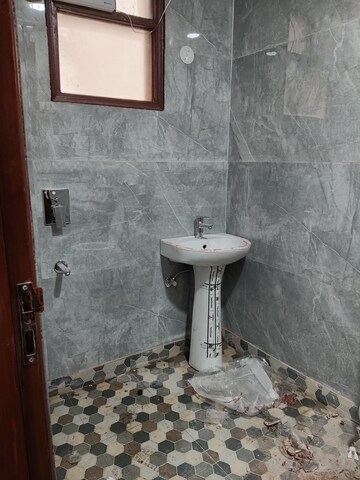 Bathroom in 3 BHK Apartment at Khirki Extension – for Rent